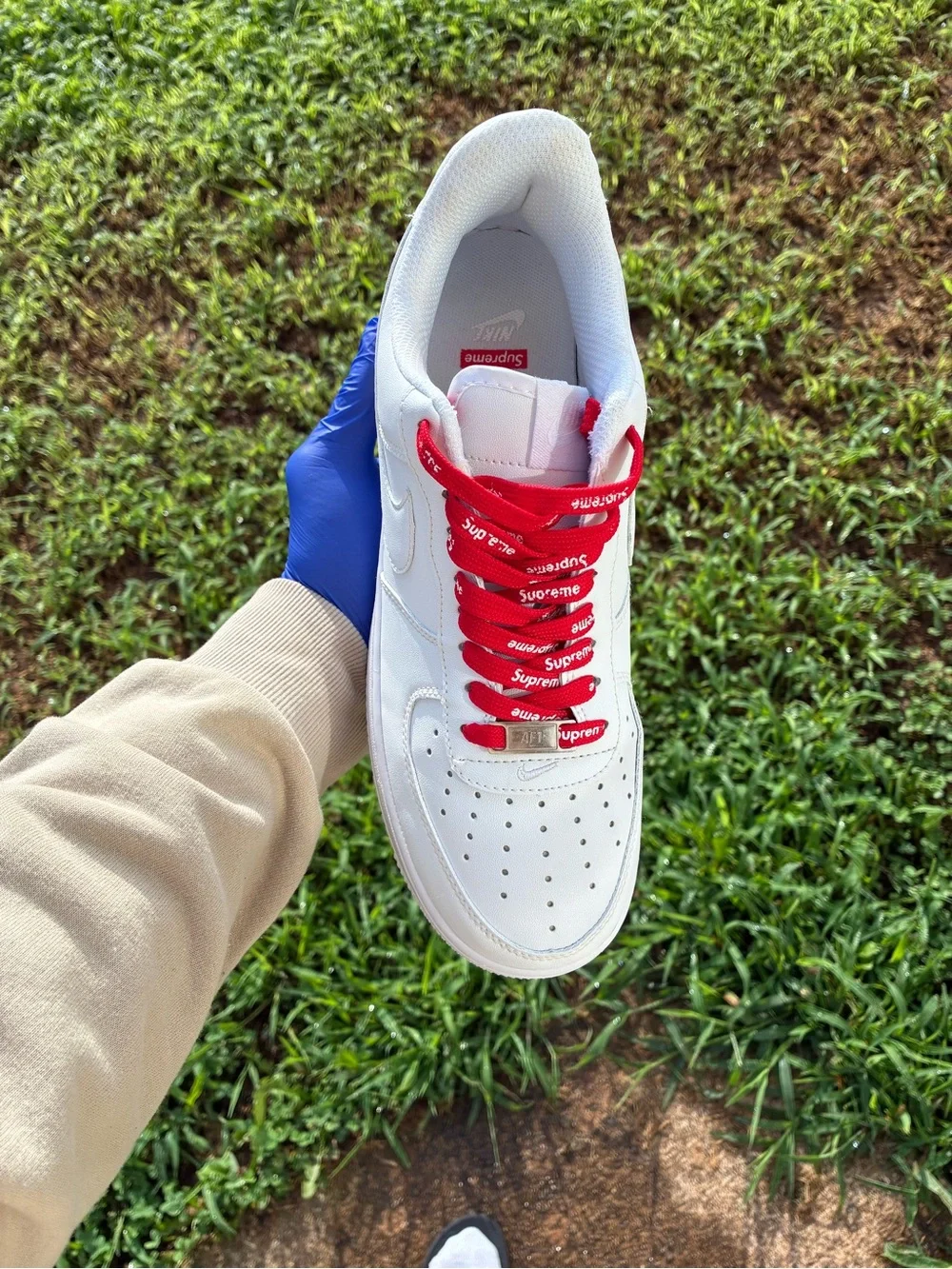 Nike White Leather Sneakers with Red Laces